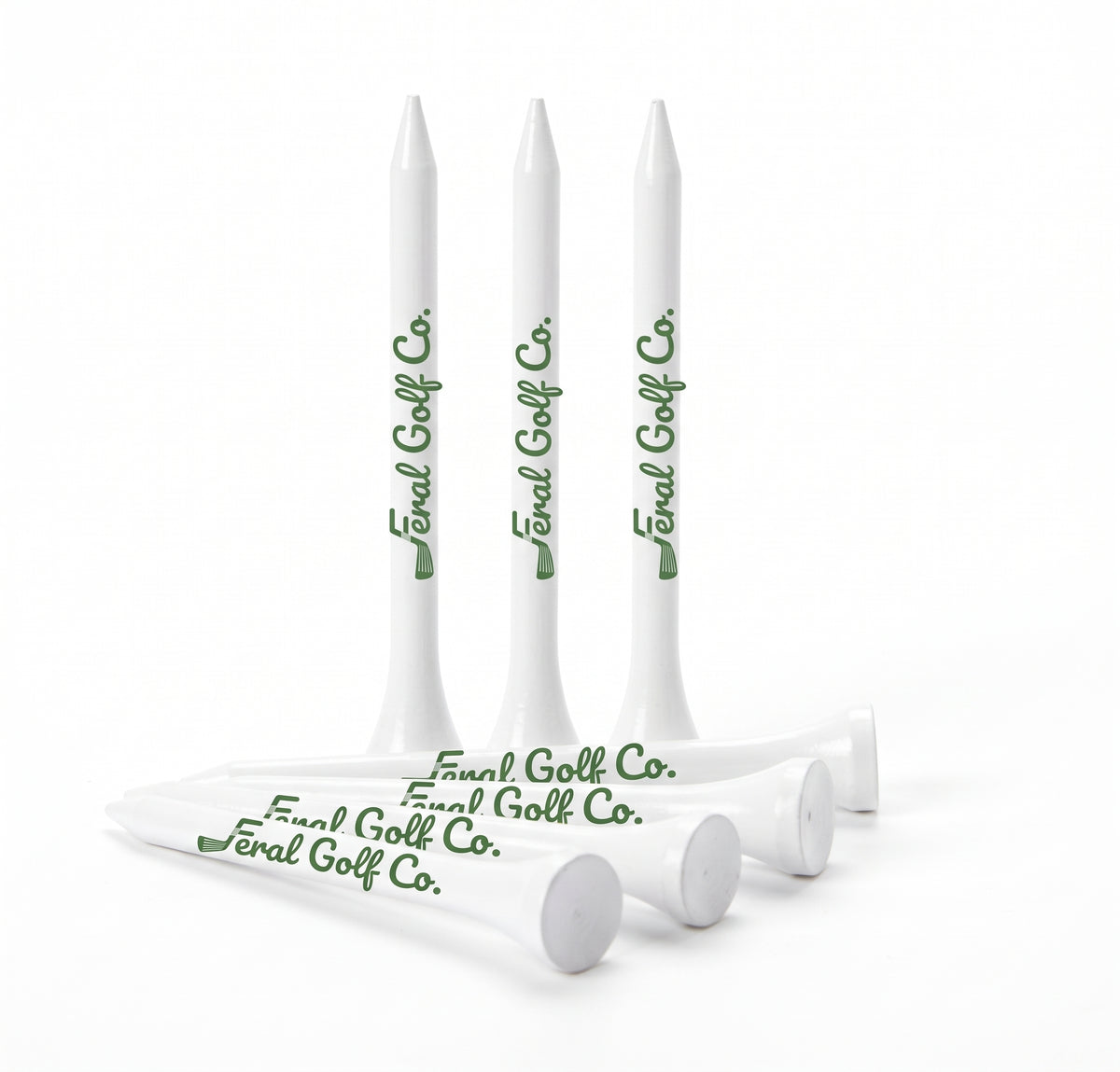 Feral Golf Co. white wooden golf tees with green logo
