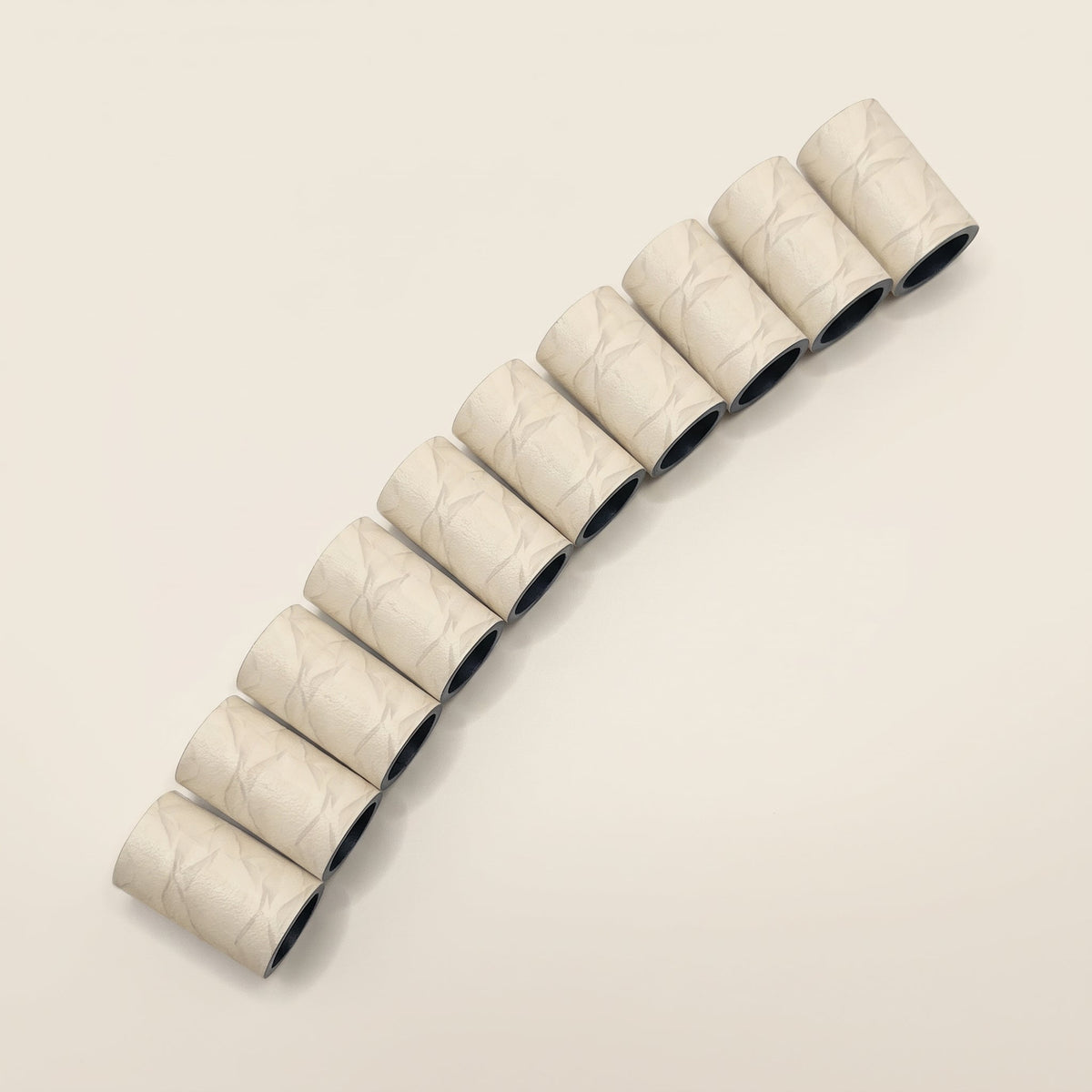 Crinkled Cream Paper Ferrule - 10-pack laid out