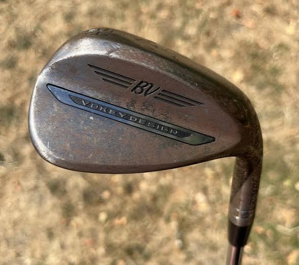 Worn Vokey wedge, before, angle two